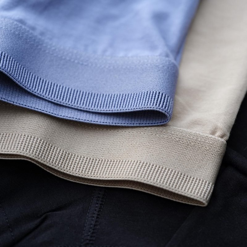 Discuss available fabric choices, waistband options, stitching details, and other product specifications.